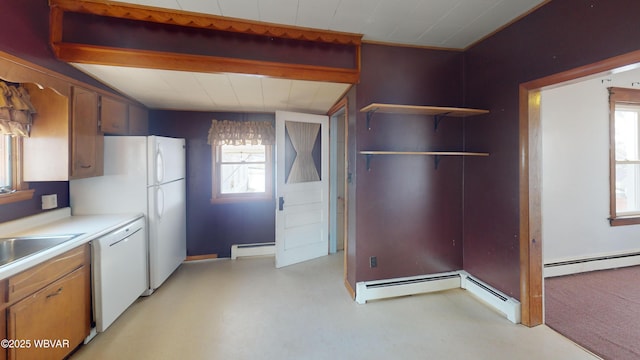 kitchen featuring dishwasher, sink, and baseboard heating