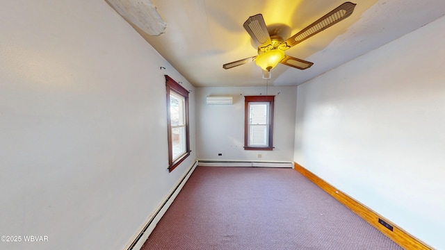 empty room featuring a wall mounted air conditioner, ceiling fan, and carpet flooring