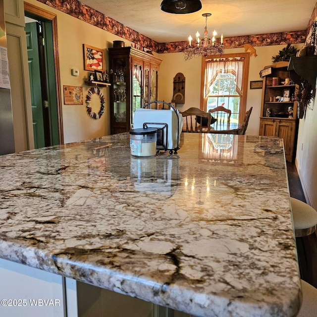 dining area featuring a chandelier