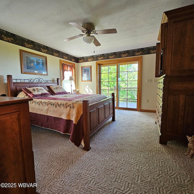 bedroom with access to outside, light colored carpet, baseboards, a ceiling fan, and a textured ceiling