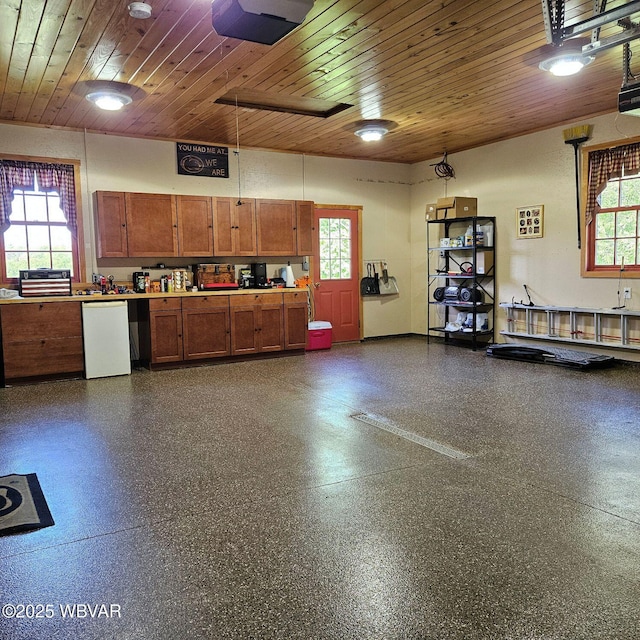 garage featuring wooden ceiling