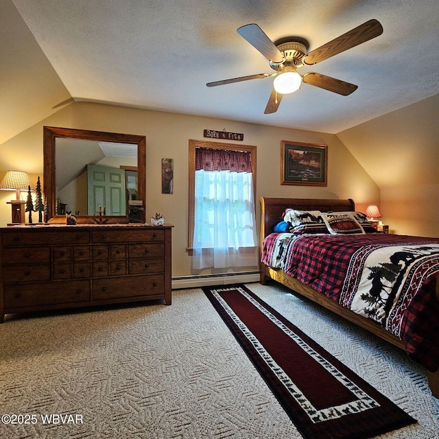 bedroom with carpet flooring, lofted ceiling, a baseboard heating unit, and ceiling fan
