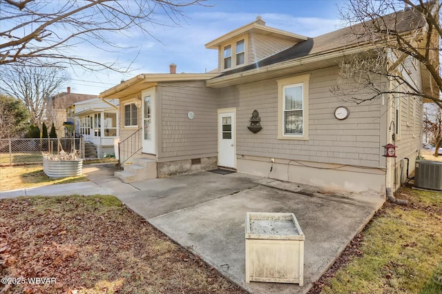 back of house with entry steps, fence, central AC, and crawl space