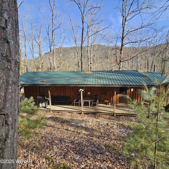 view of outbuilding featuring a mountain view