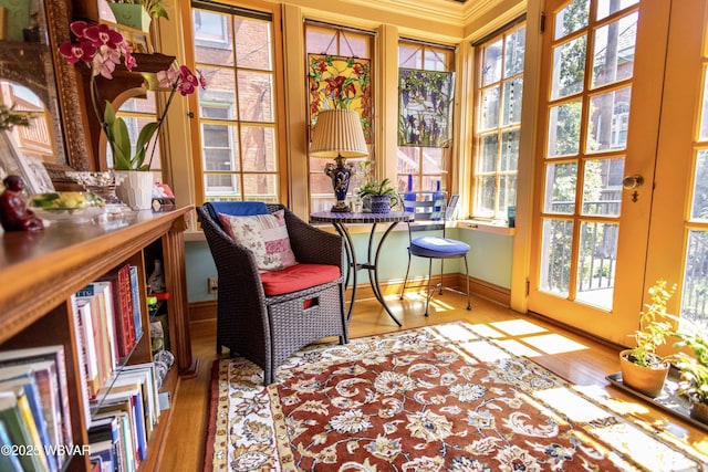 sitting room with hardwood / wood-style floors