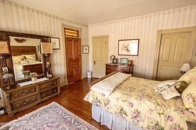 bedroom featuring dark hardwood / wood-style floors