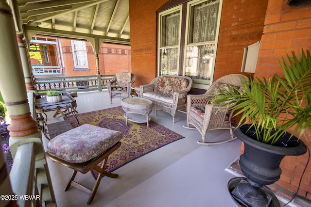 view of patio featuring a porch