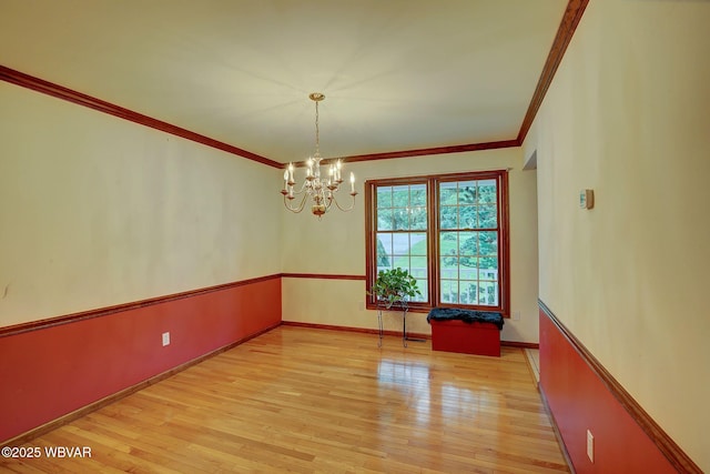 20 Hillcrest Dr, Cogan Station, PA 17728 - empty room featuring ornamental molding, a chandelier, and light wood finished floors