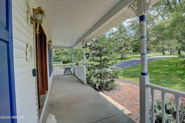 20 Hillcrest Dr, Cogan Station, PA 17728 - covered porch with view of wooded area and a yard