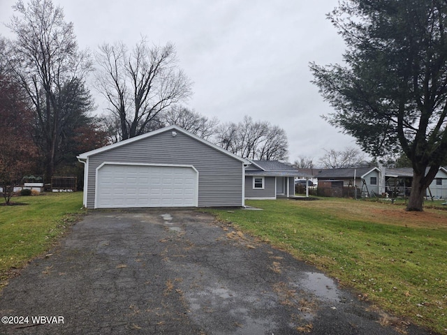 exterior space featuring a front yard and a garage