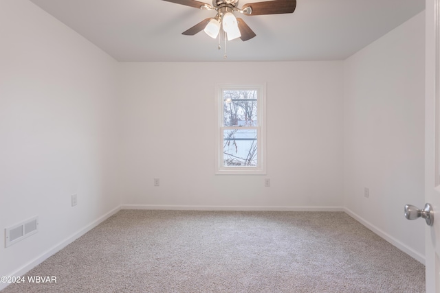 carpeted empty room with ceiling fan