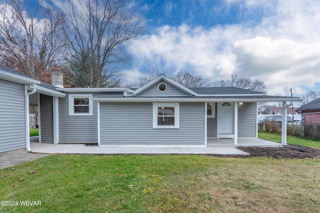 view of front of home with a front yard