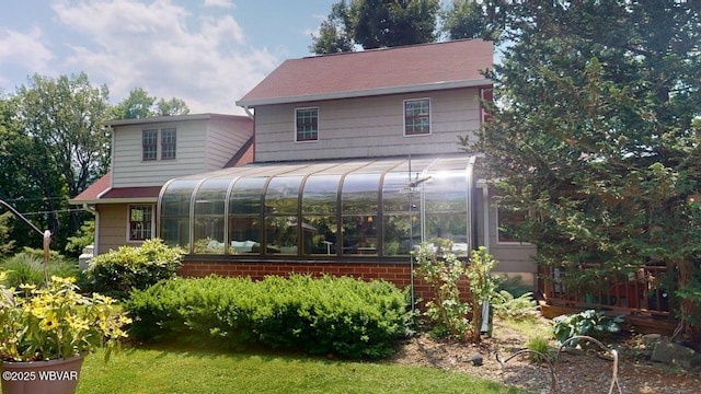 524 Pardee Rd, Millmont, PA 17845 - back of house featuring a sunroom and brick siding