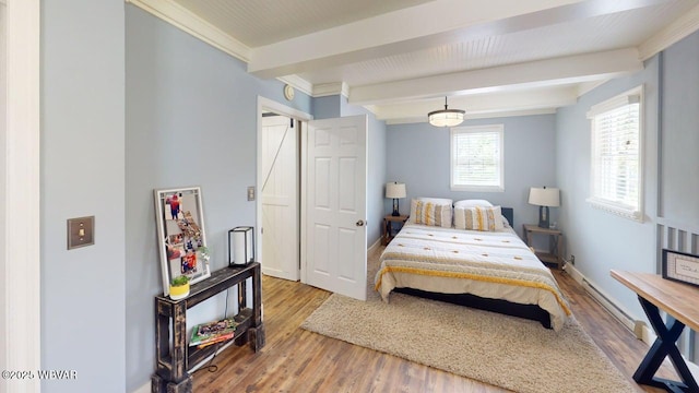 524 Pardee Rd, Millmont, PA 17845 - bedroom featuring beamed ceiling, wood finished floors, and baseboard heating