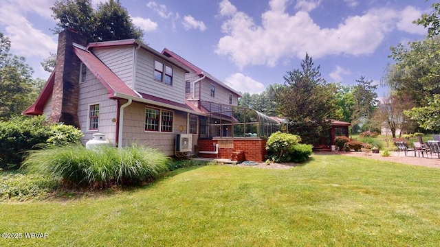 524 Pardee Rd, Millmont, PA 17845 - rear view of property with a chimney and a lawn