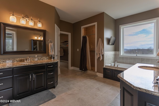 bathroom featuring tile patterned floors and vanity