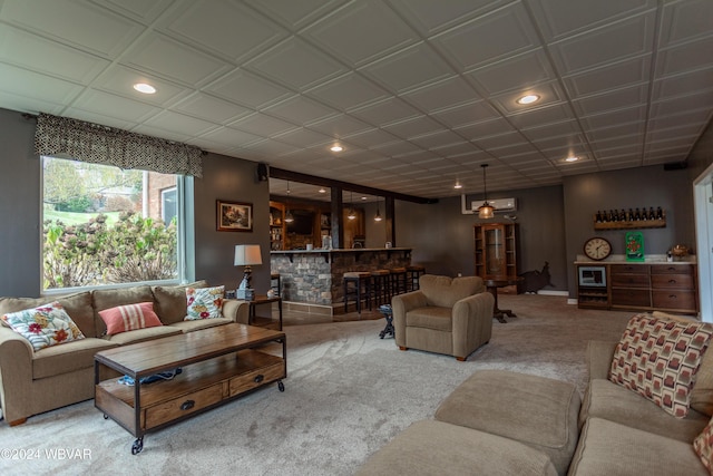 living room featuring carpet floors and bar