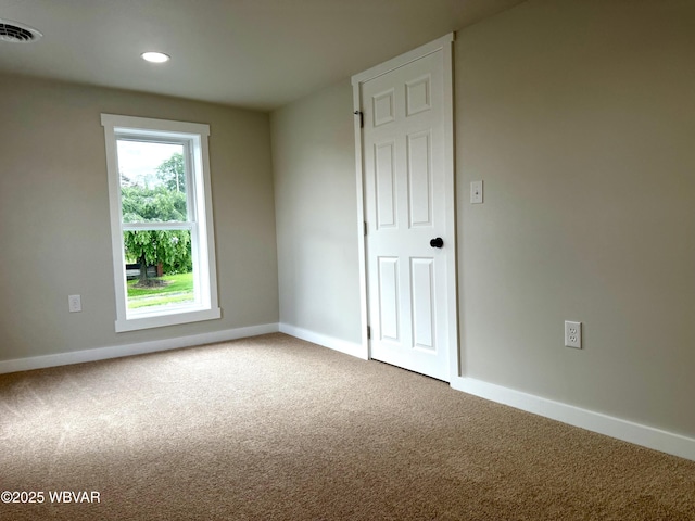 218 High St, Lock Haven, PA 17745 - carpeted spare room with baseboards and recessed lighting