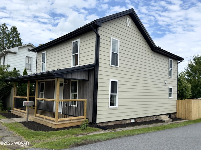 218 High St, Lock Haven, PA 17745 - view of property exterior featuring covered porch