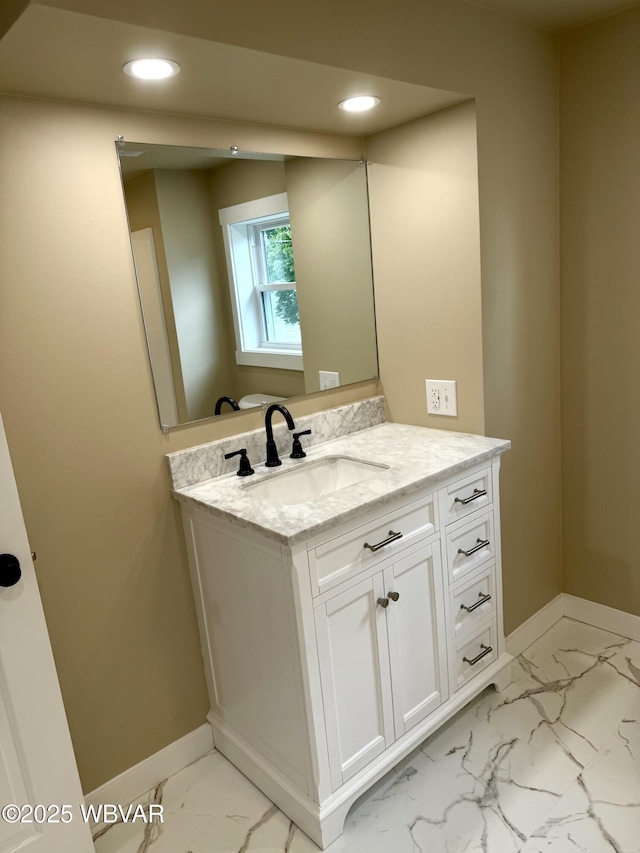 218 High St, Lock Haven, PA 17745 - bathroom featuring marble finish floors, recessed lighting, and vanity