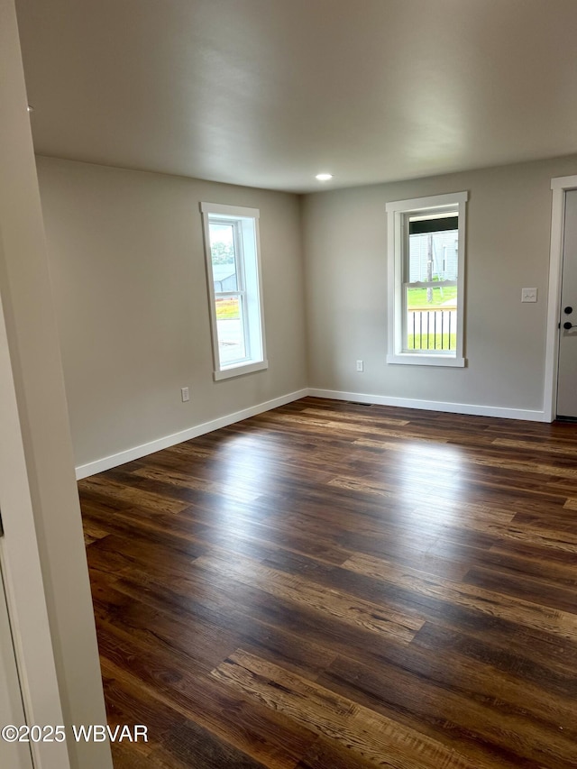 218 High St, Lock Haven, PA 17745 - unfurnished room featuring dark wood-type flooring and baseboards
