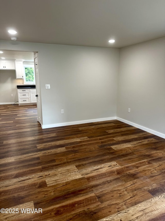 218 High St, Lock Haven, PA 17745 - spare room with dark wood-type flooring and recessed lighting