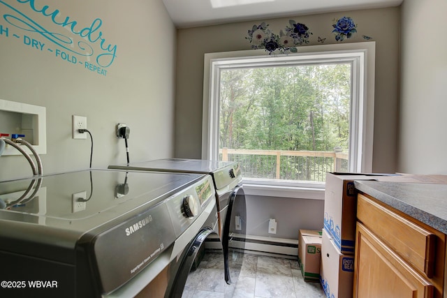 260 Selkirk Rd, Williamsport, PA 17701 - washroom featuring washer and clothes dryer, healthy amount of natural light, baseboards, and cabinet space