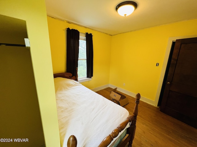 bedroom featuring hardwood / wood-style floors