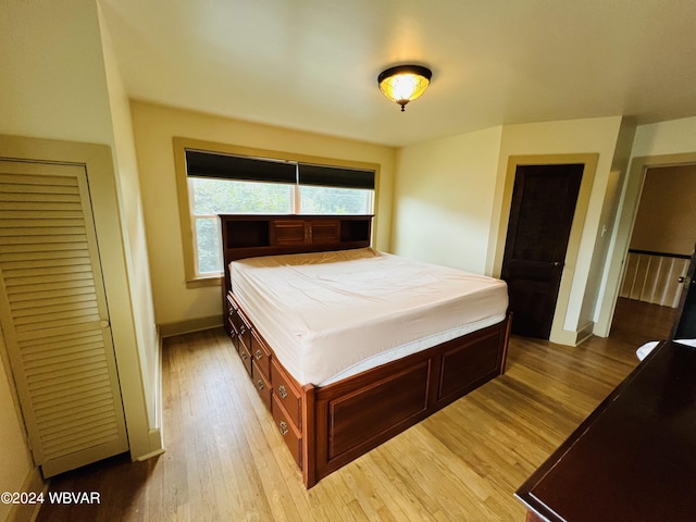 bedroom with light hardwood / wood-style floors