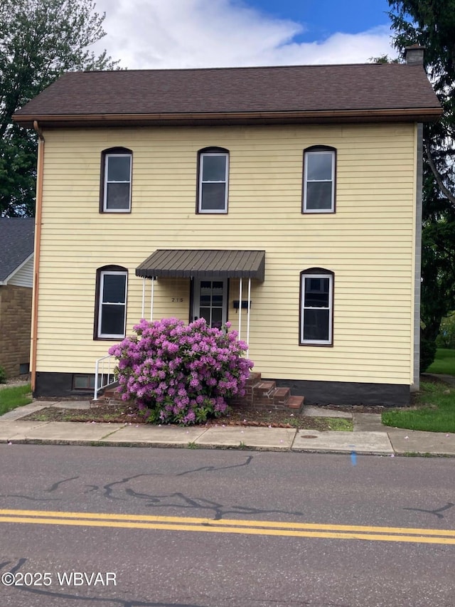 215 E 8th St, Watsontown, PA 17777 - view of front of house featuring a chimney