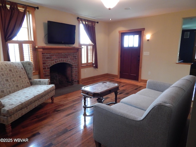796 Ellis Artley Rd, Muncy, PA 17756 - living area with hardwood / wood-style flooring, a brick fireplace, and baseboards