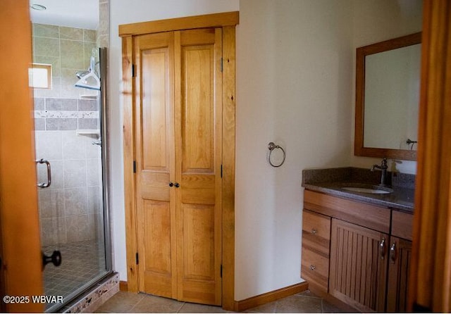 796 Ellis Artley Rd, Muncy, PA 17756 - bathroom with a stall shower, tile patterned flooring, vanity, and baseboards