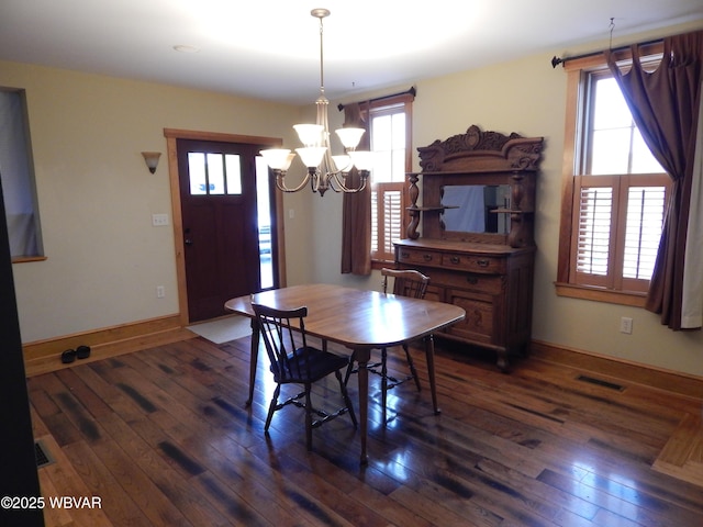 796 Ellis Artley Rd, Muncy, PA 17756 - dining area featuring a chandelier, plenty of natural light, and dark wood-type flooring