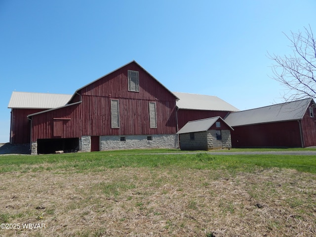 796 Ellis Artley Rd, Muncy, PA 17756 - view of side of property with a barn, a yard, and an outbuilding