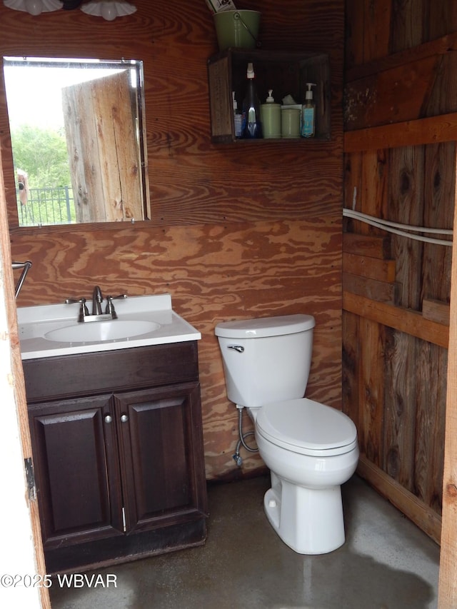 796 Ellis Artley Rd, Muncy, PA 17756 - bathroom with toilet, vanity, and concrete floors
