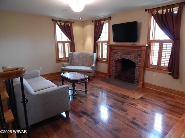 796 Ellis Artley Rd, Muncy, PA 17756 - living area with baseboards, hardwood / wood-style floors, and a brick fireplace