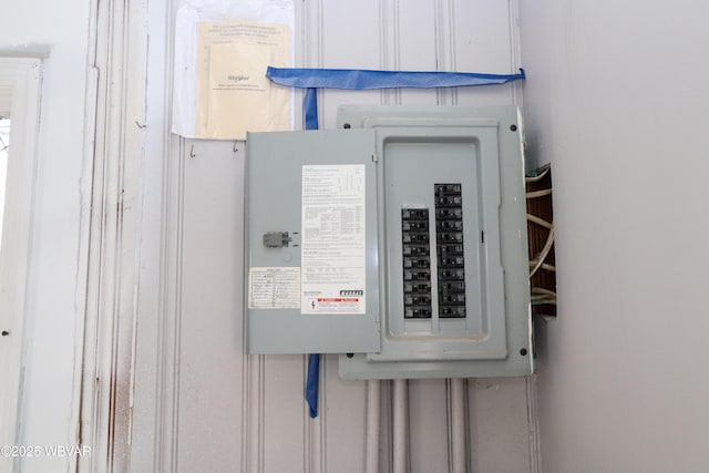 utility room featuring electric panel