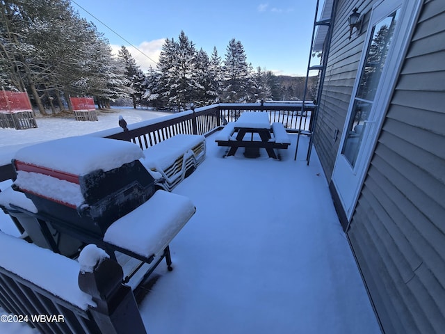 view of snow covered deck