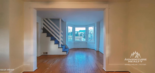 hallway featuring hardwood / wood-style flooring