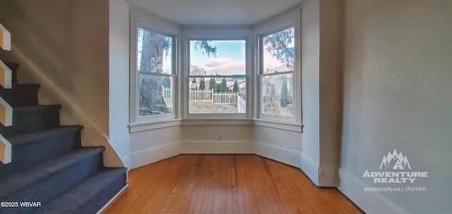 interior space with hardwood / wood-style flooring