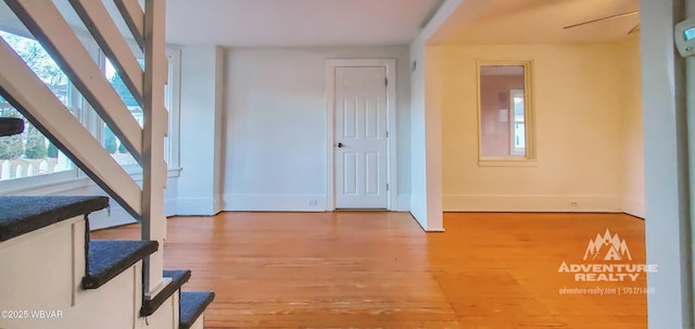 entryway with hardwood / wood-style floors