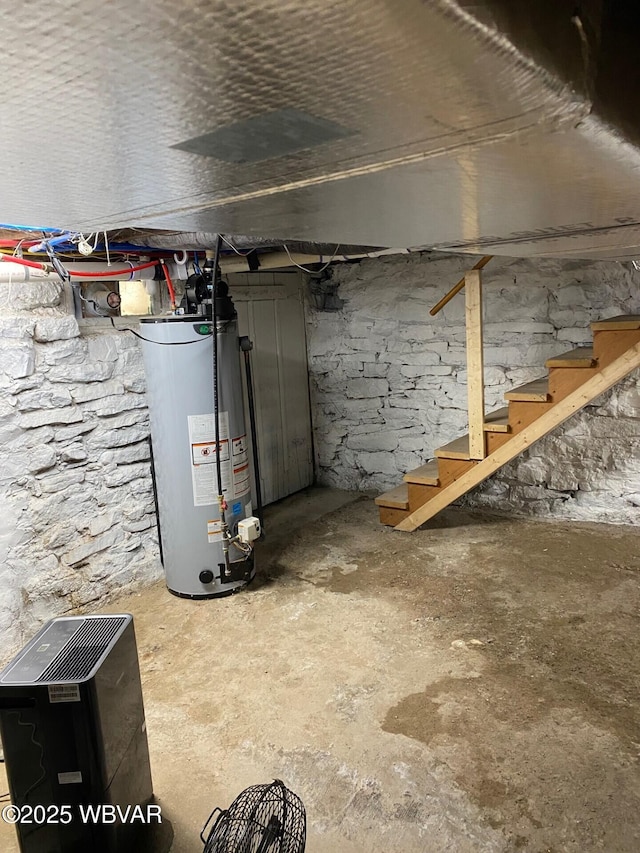 339 Spruce St, Jersey Shore, PA 17740 - unfinished basement with water heater and stairs
