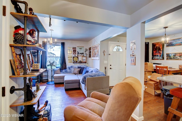 339 Spruce St, Jersey Shore, PA 17740 - living room featuring a chandelier and wood-type flooring