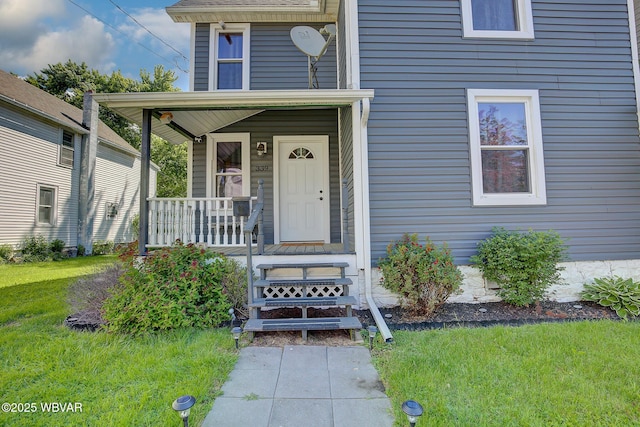 339 Spruce St, Jersey Shore, PA 17740 - doorway to property with a porch and a yard