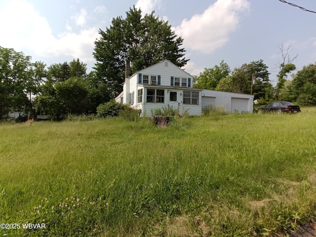 71 Hillcrest Dr, Towanda, PA 18848 - back of property featuring a garage