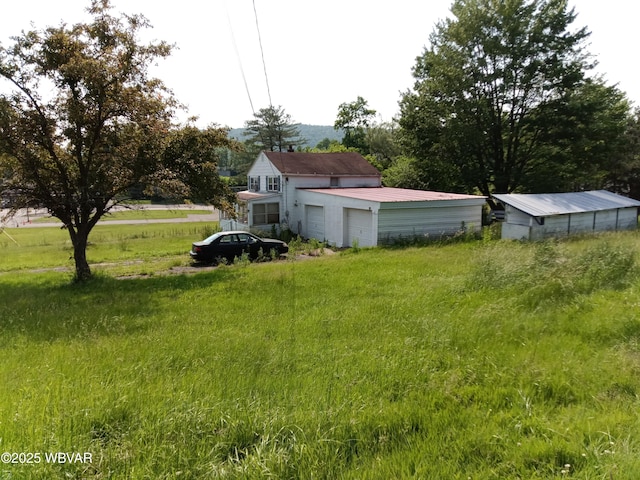 71 Hillcrest Dr, Towanda, PA 18848 - view of yard featuring a garage