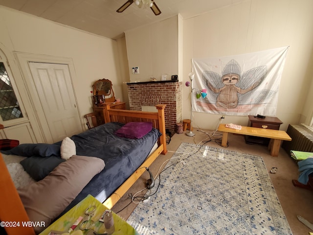 bedroom featuring radiator, carpet floors, and ceiling fan