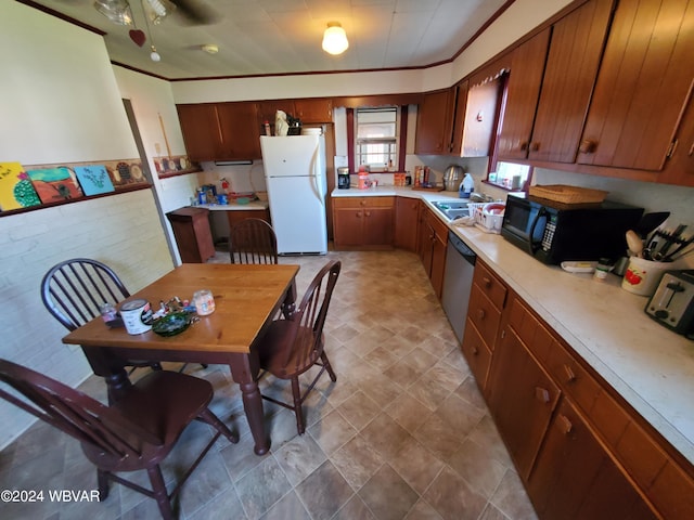 kitchen featuring white fridge, stainless steel dishwasher, ceiling fan, and sink