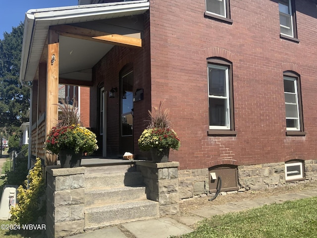 view of property exterior featuring a porch