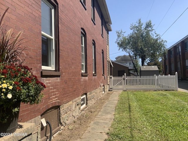 view of home's exterior featuring a yard